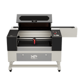 Smussatrici e tagliatrici a raggio da 100W a CO2 (500x700mm), rinforzate e montate automaticamente